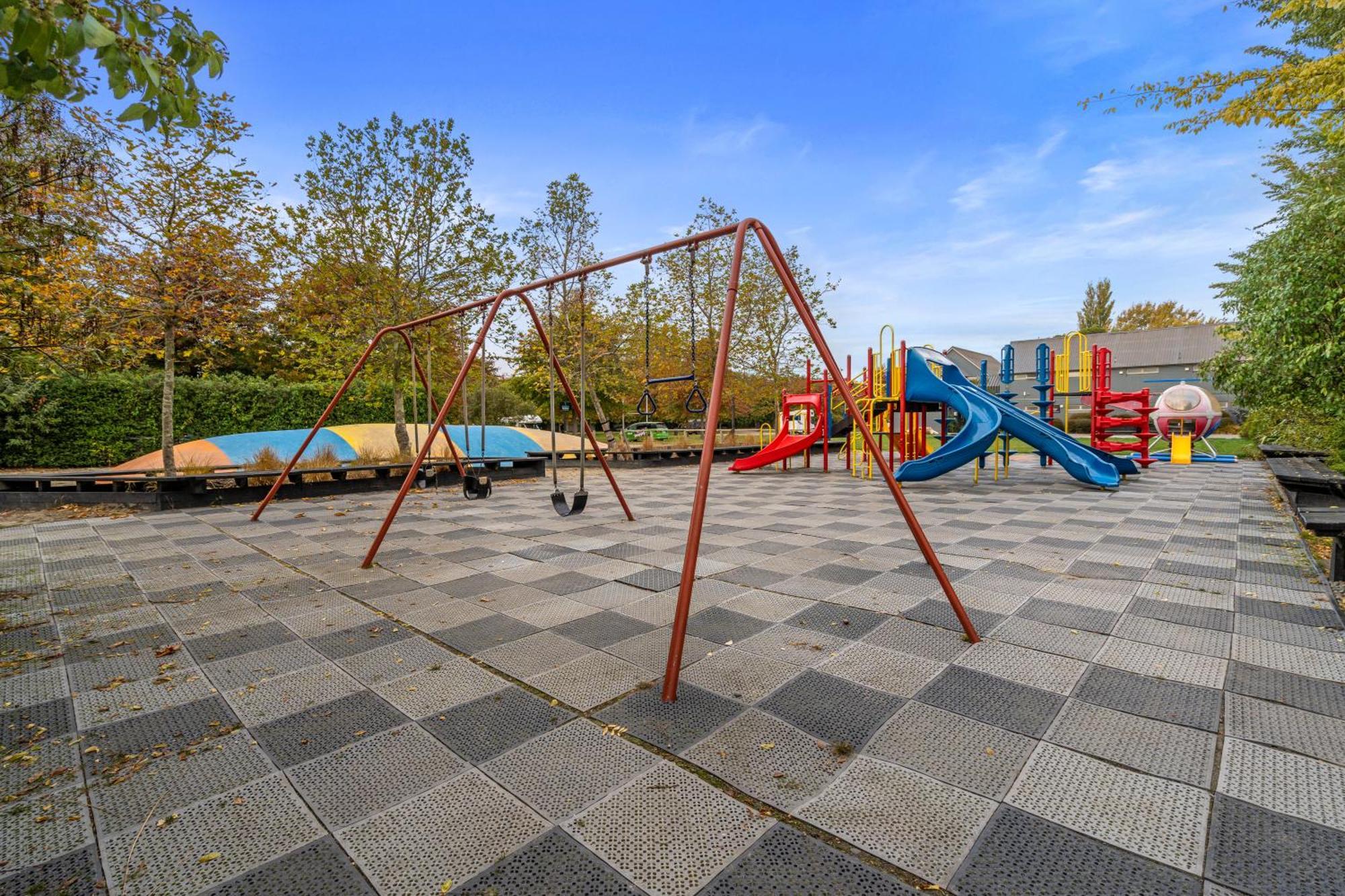 Tasman Holiday Parks - Крайстчёрч Экстерьер фото Playground in the village